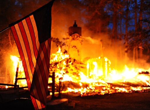 America Both in Crisis and on Trial